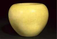 A yellow glazed globular waterpot